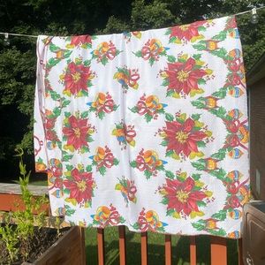 Vintage colorful Christmas tablecloth with poinsettia & ornaments patter…